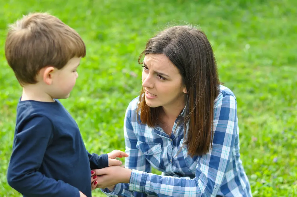 Image of parent and child communicating about bullying