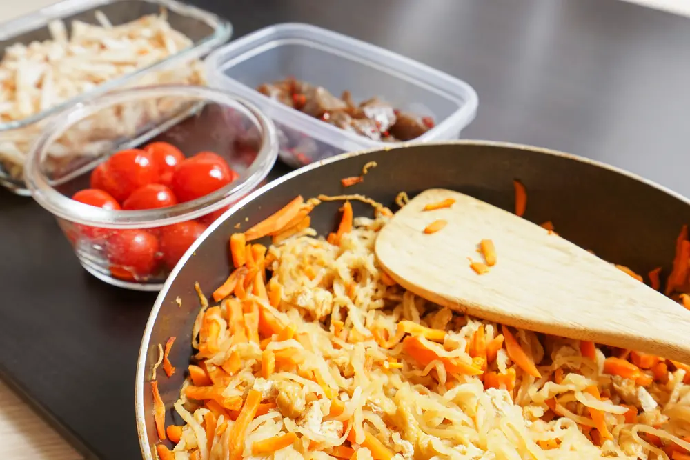 Image of batch cooking, meals prepared and stored in tupperware boxes